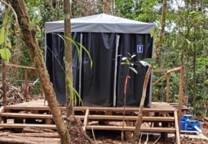 Figure 4. Latrine at a drill camp. Water from the latrines drains into a biodigester where the sewage is broken down organically